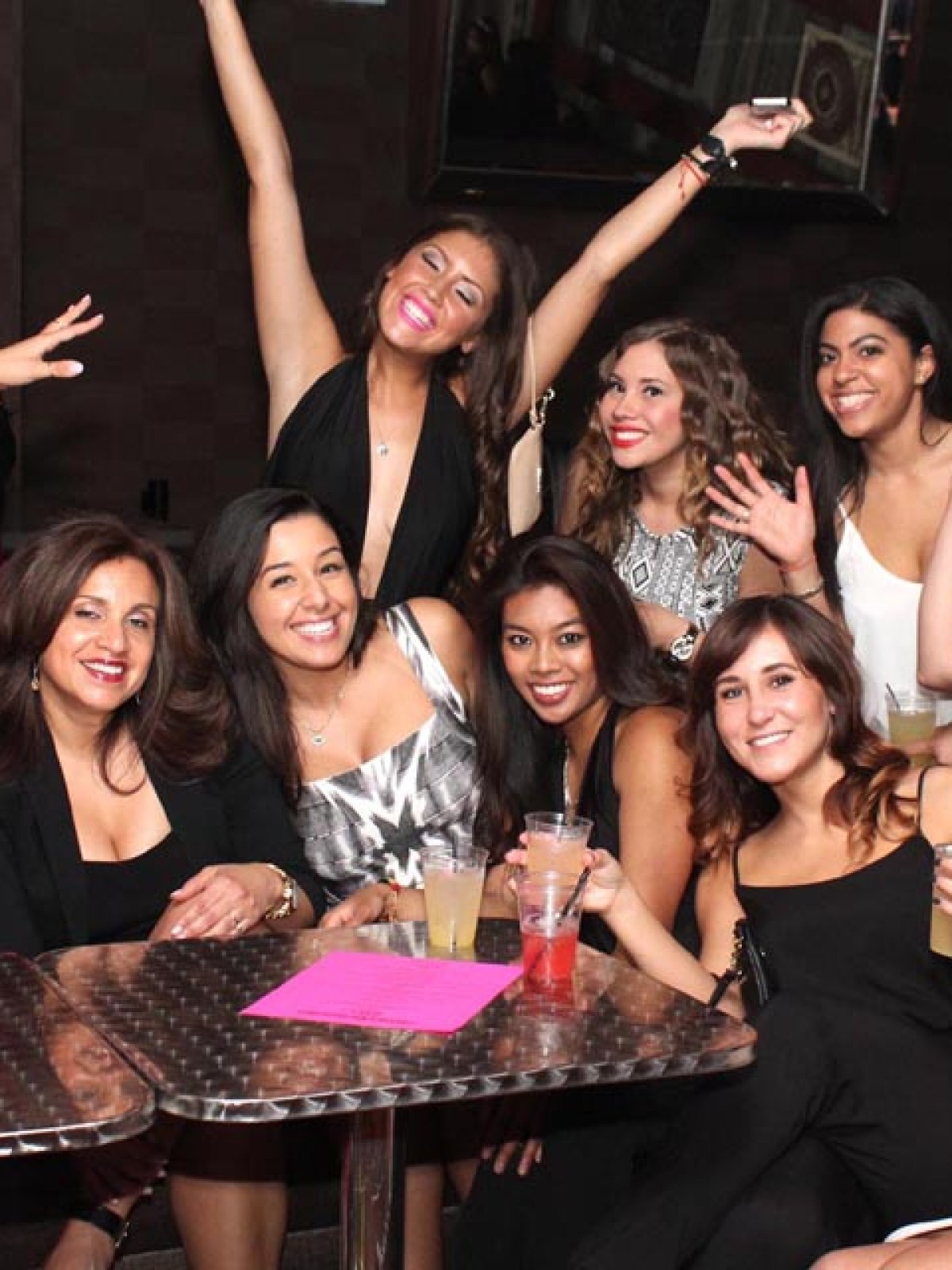 Christine Evans, Anya Ayoung-Chee sitting posing for the camera