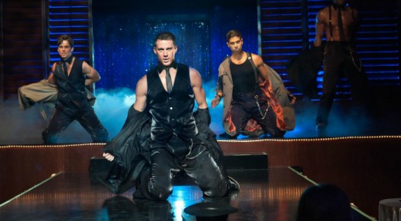 magicmikemain Four male dancers on stage in vests, performing with smoke effects and blue lighting.